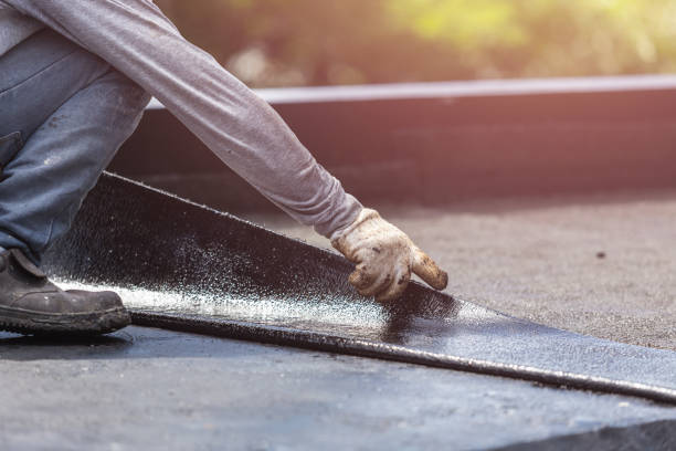 Professional Waterproofing technician working in Northfield, KY